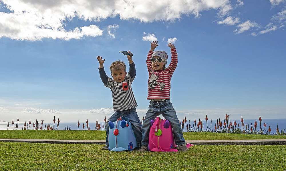 kids with their trunkies ready to go on a madeira itinerary trip