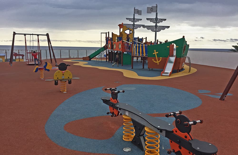 playground for children in Madeira in calheta in a form of a pirate ship by the sea.