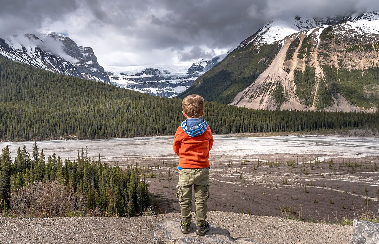 boy looking at the columbian Icefields 