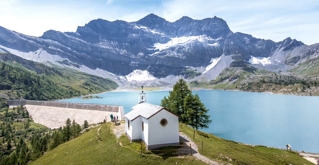 chapel with mountain lake