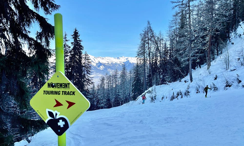Ski touring sign on a ski post in Valais