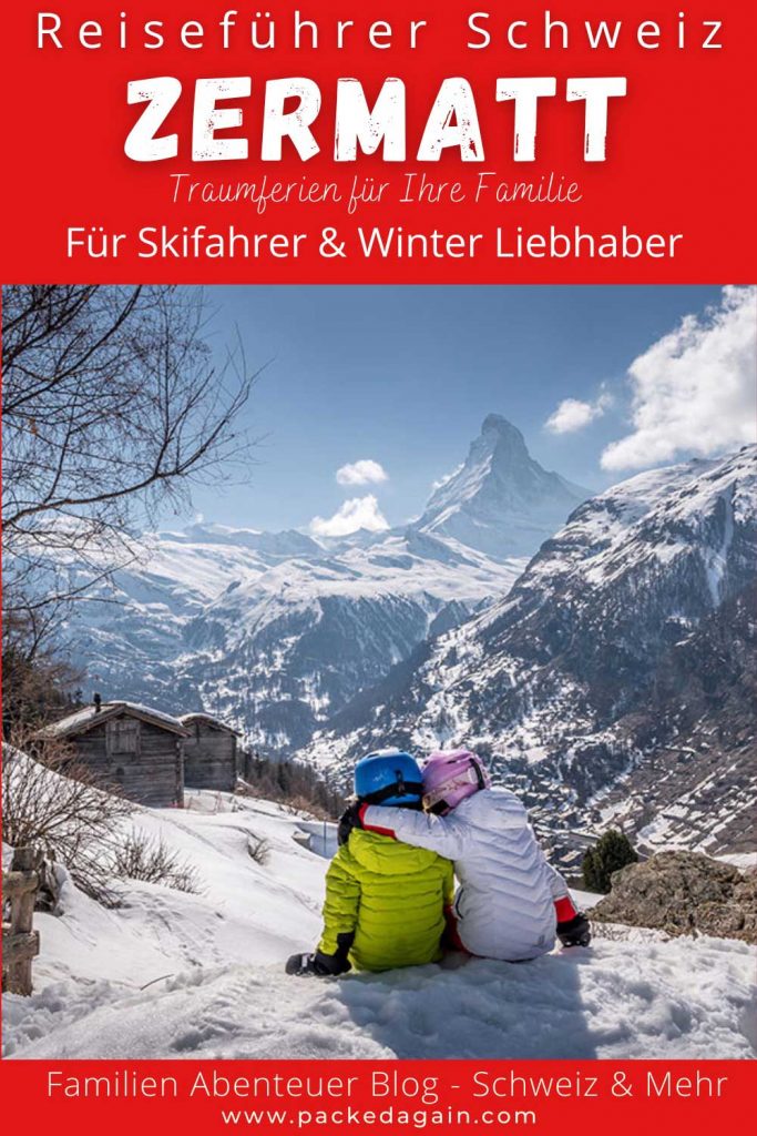 kinder bestaunen das Matterhorn im Winter