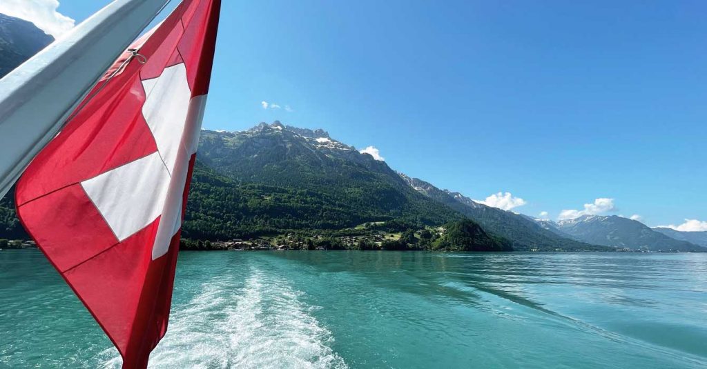 swiss flag and swiss lake