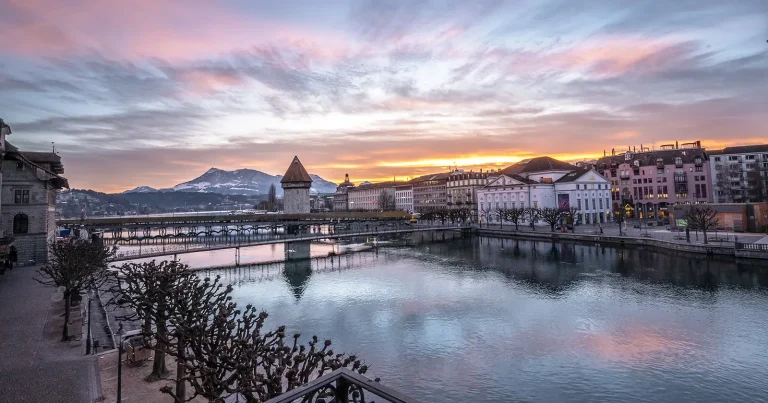 the city Lucerne in Winter with sunset glowing lights