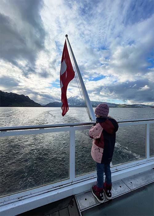 girl on a boat at lake lucerne