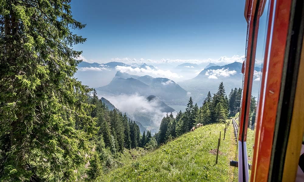 view from a cogwheel train on pilatus over lake lucerne