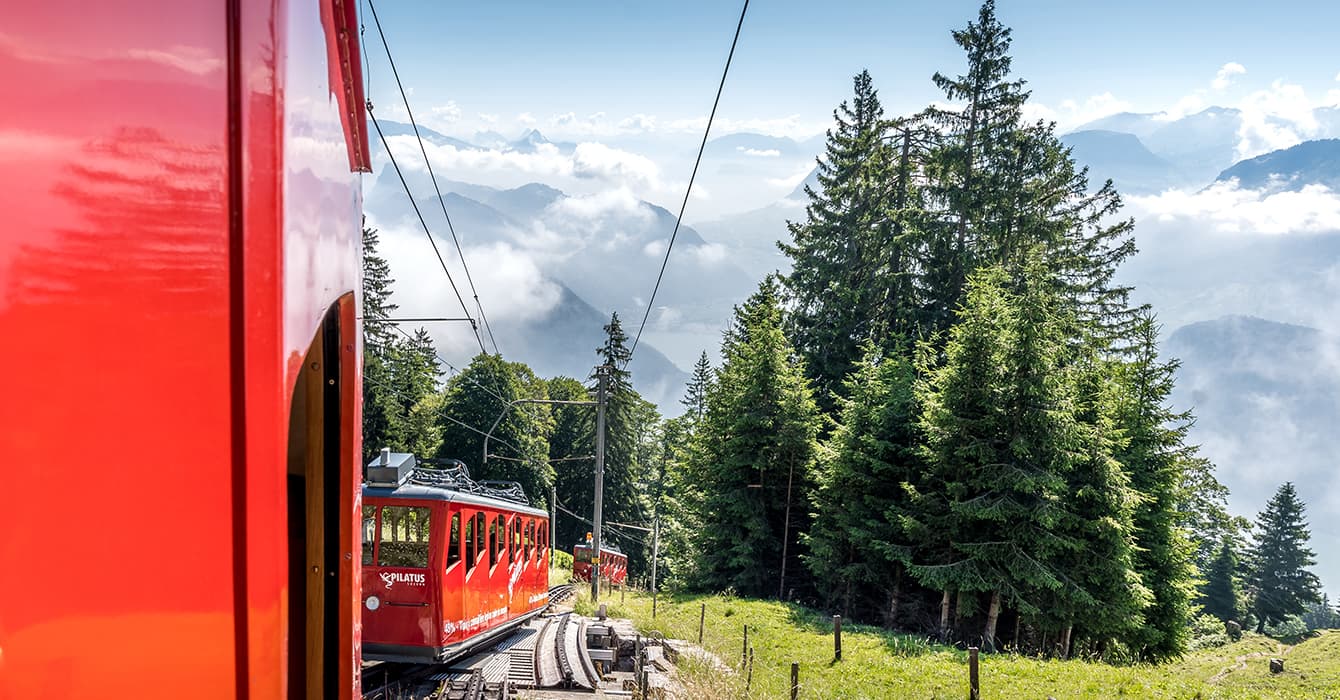 cogwheel train riding up Mount Pilatus in Switzerland