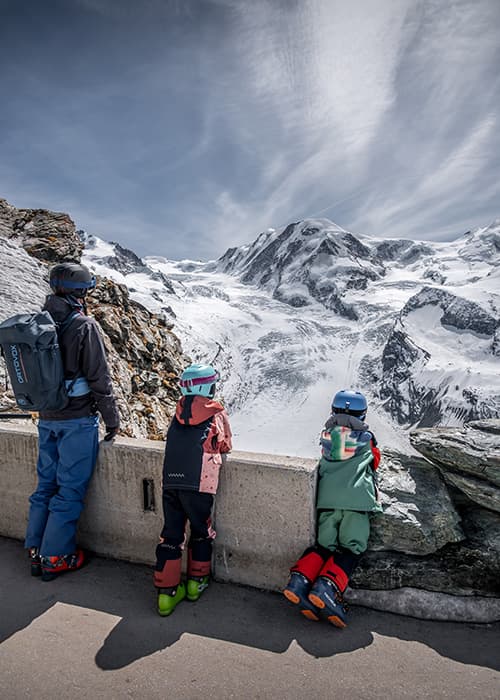 a family looking down on to the Gorner Gletscher in Zermatt
