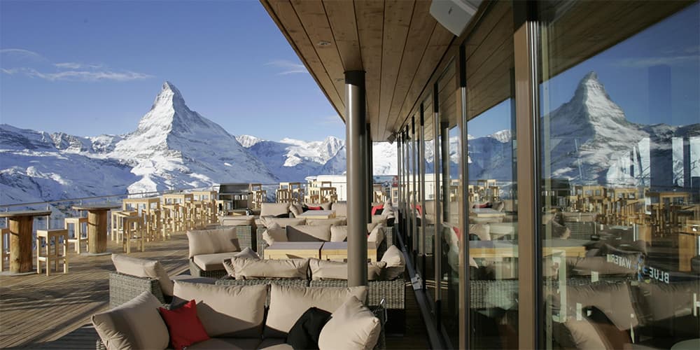 a mountain restaurant in zermatt with view over to the matterhon in winter