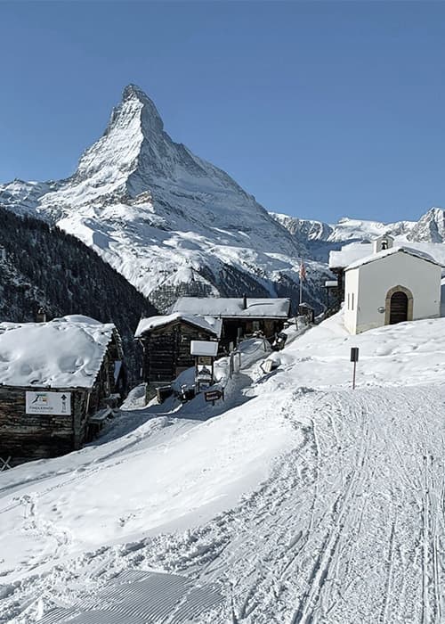 winter wonderland at findeln in zermatt with the Matterhons and old alpine houses