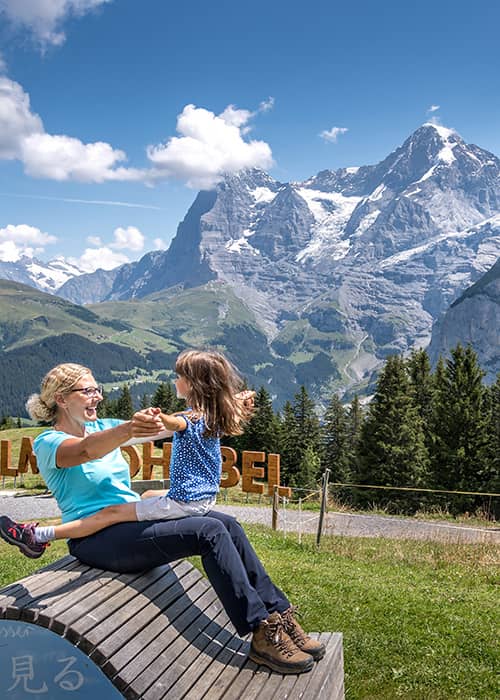 mum and daughter at the Allmendhubel Wooden letters