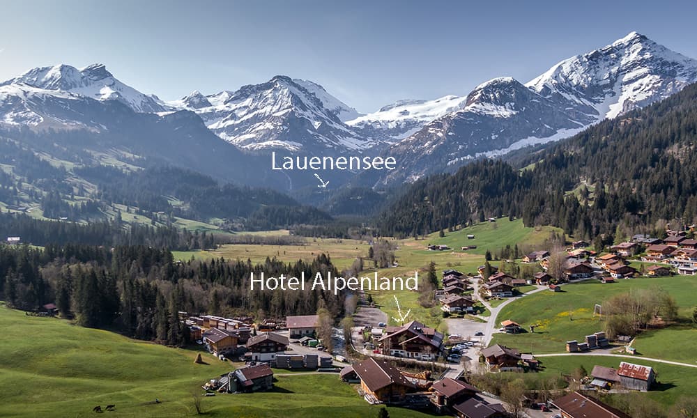 houses and the Hotel Alpenland Lauenen seen from above