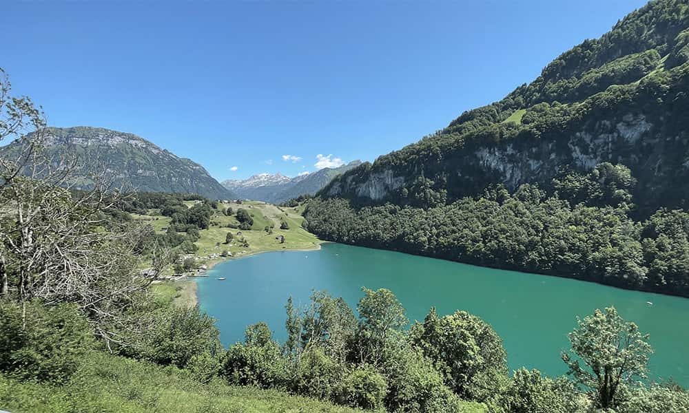 photos of the seelisbergsee during a summer day
