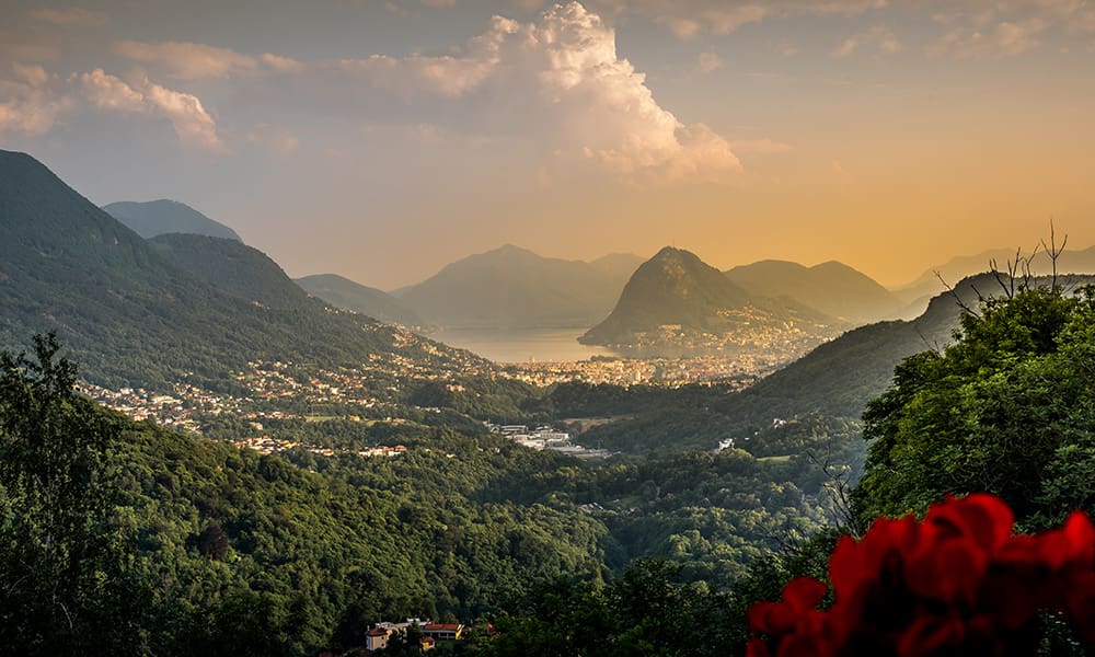 sunset picture from the lugano region in ticino looking down on to lage lugano