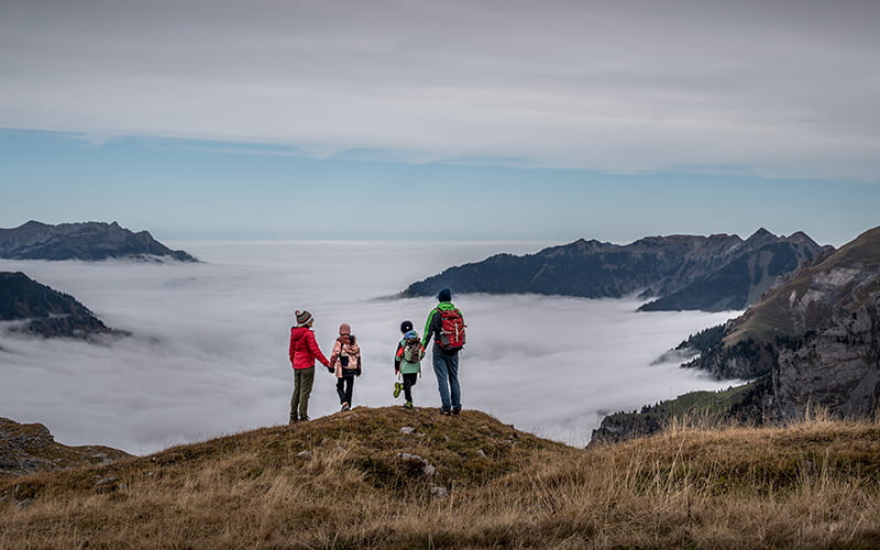 family looking over the cloud of sea in Switzerland