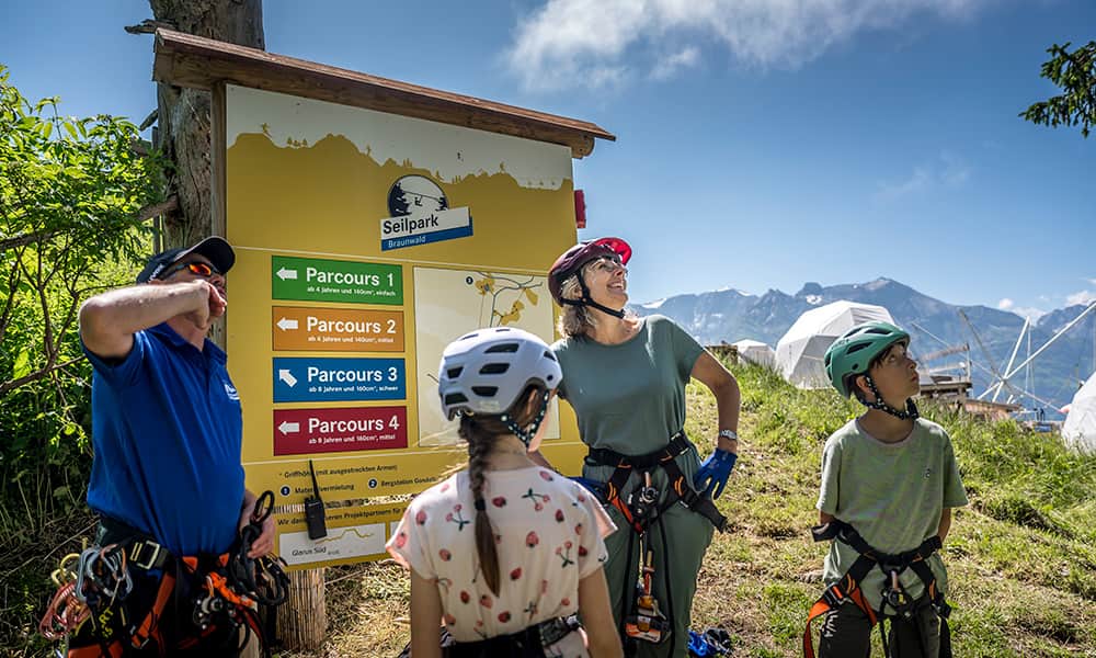 family at the Braunwald Seilpark in Braunwald