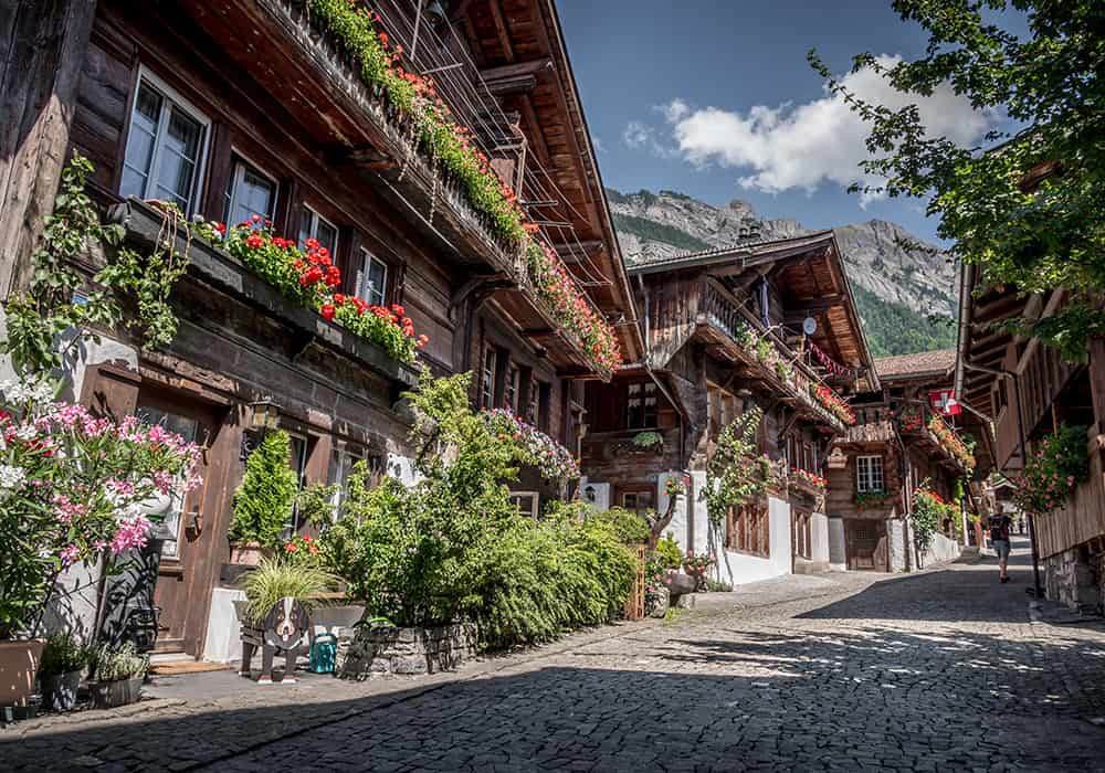 pretty street, brunngass in the Swiss Village Brienz with lots of flowers