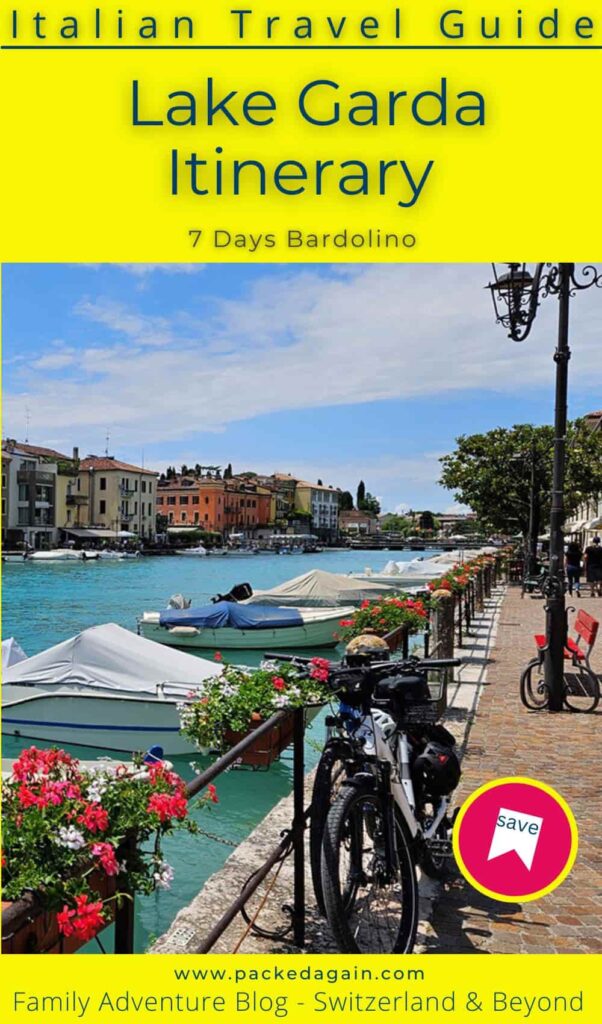 front cover of a travel guide. The cover contains fishing boats shown in a harbour in an italian village called Bardolino