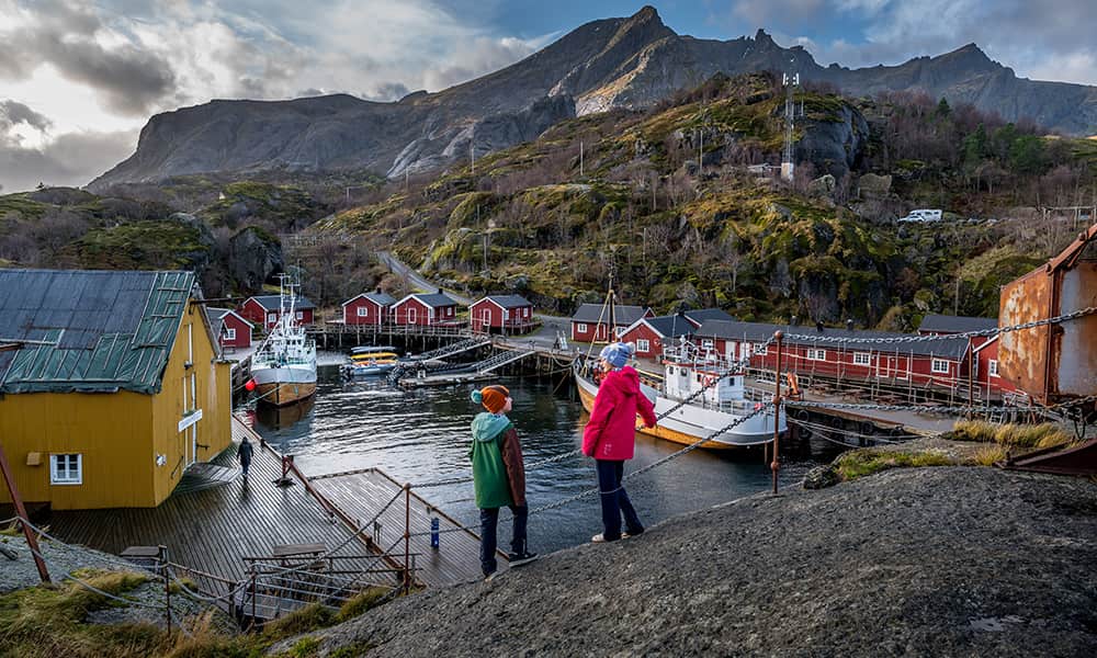 children in the historic fishing village Nusfjord in Lofoten