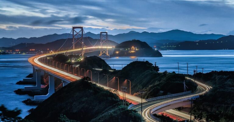 driving in japan you will cross this car bridge in Japan during the evening with lights.