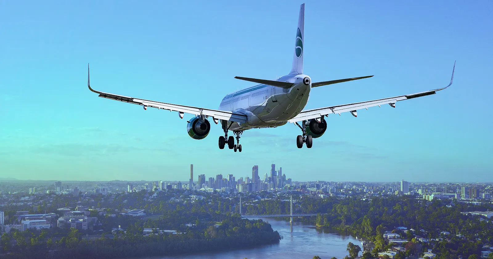 a plane aproaching a city ready to land