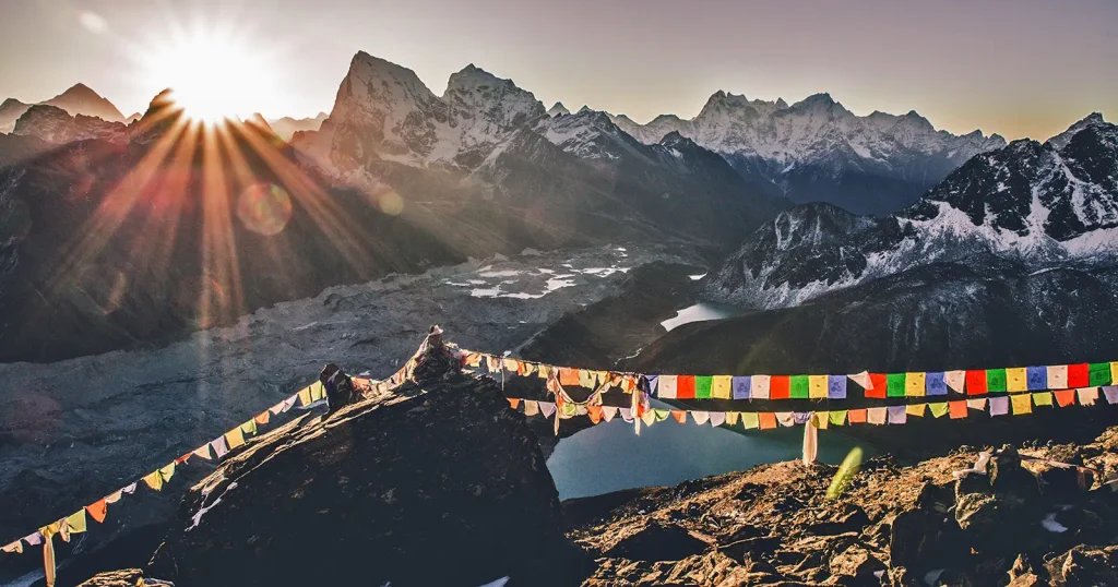 nepal Everest base camp on sunset with prayer flags