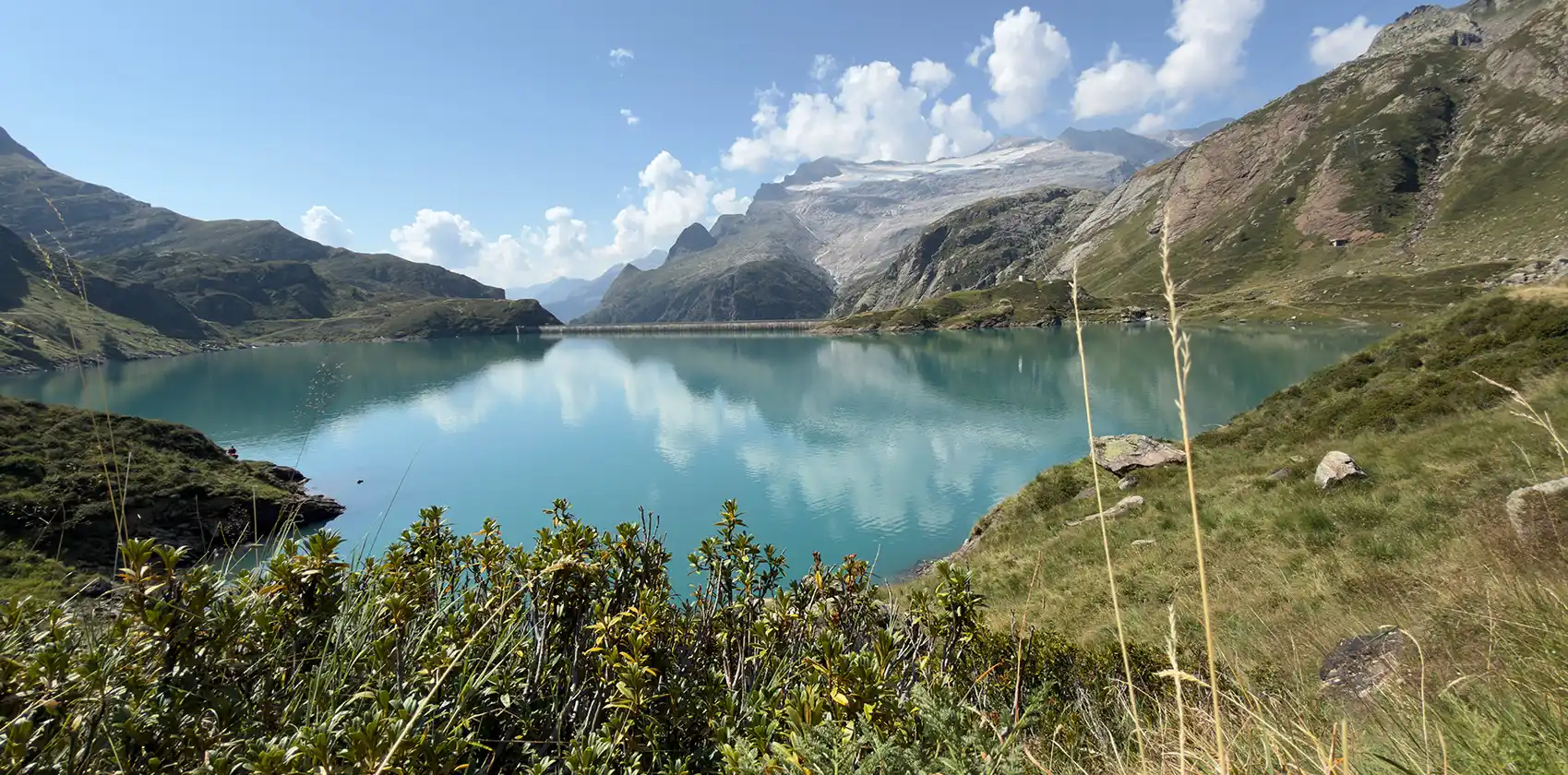 Mountain lake in Robiei Ticino with the galcier basodino in the back
